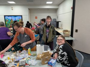 Elyse Young, Liam Young and Angeleena Medsker helping make decoupage shells | Kiwanis Kraft Days | Kiwanis Club of Bradford